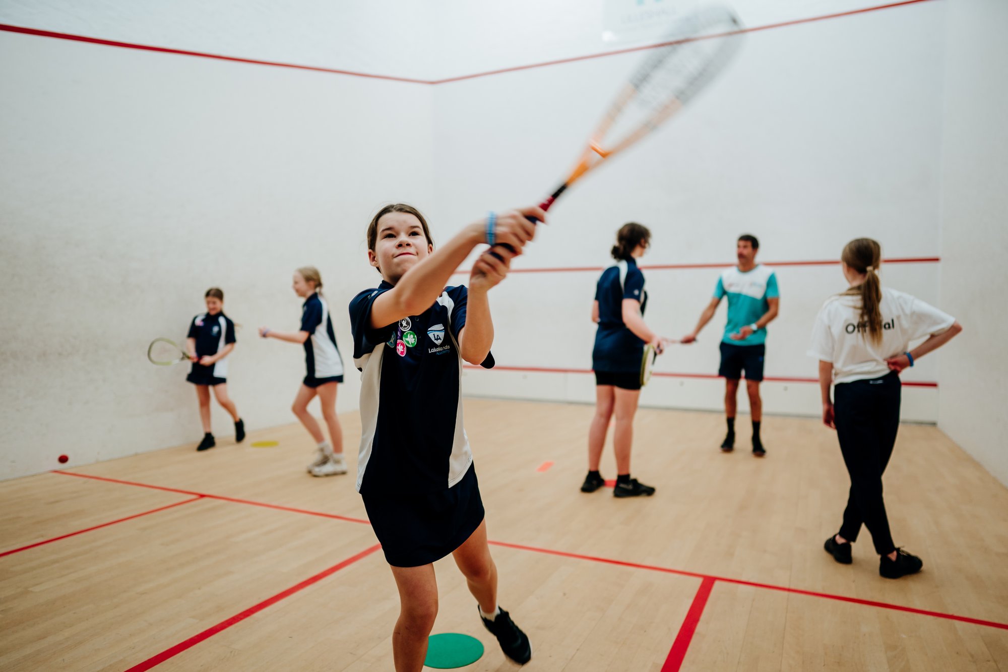 Trying squash at This Girl Can School Games event