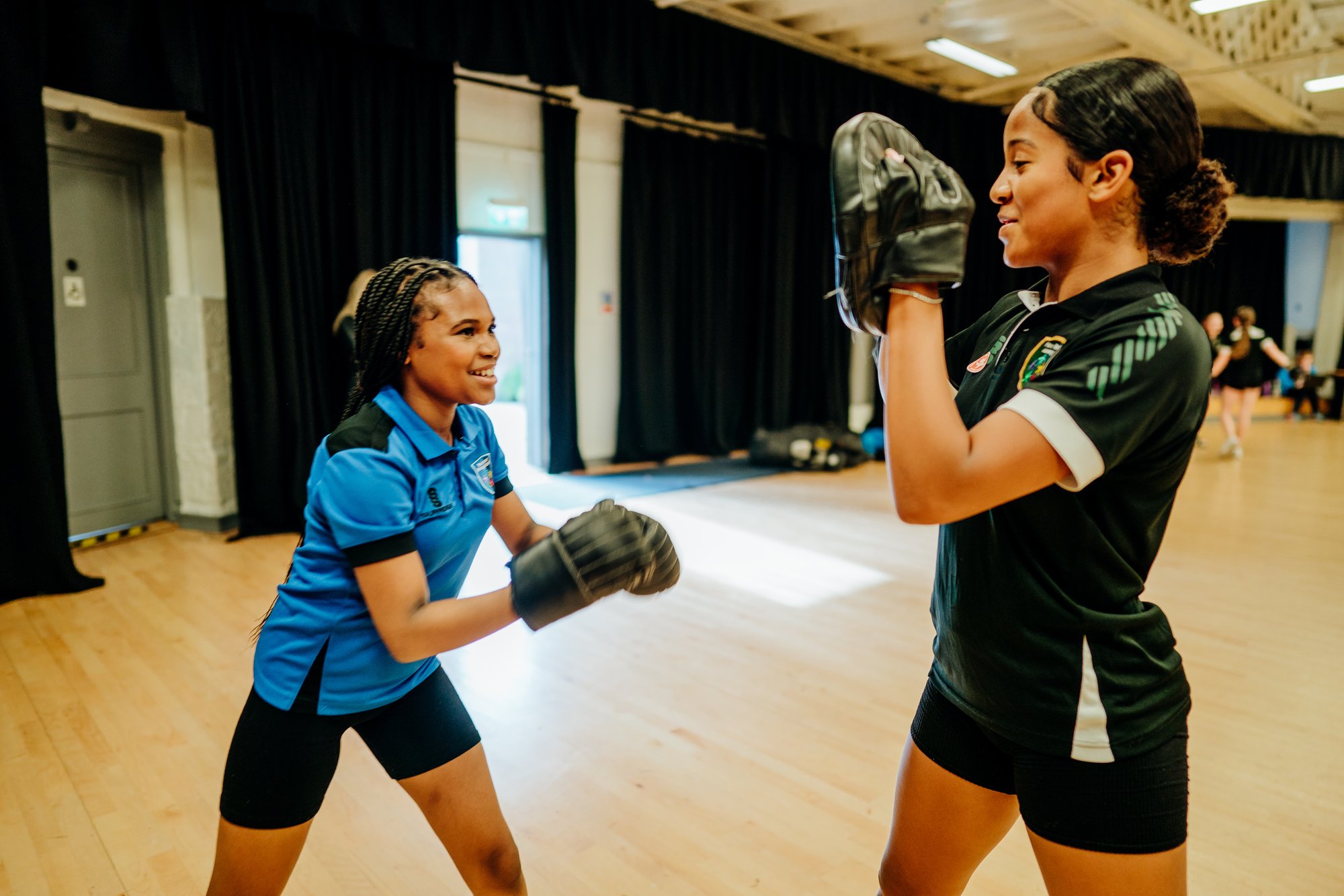 Female pupils trying Boxing at This Girl Can School Games event